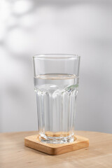 Pure water in the glass is on the table