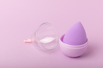 Beauty blender.Colorful beauty sponges on lilac background. Cosmetic tool for applying and blending products such as foundation and concealer. Copy space. place for text.