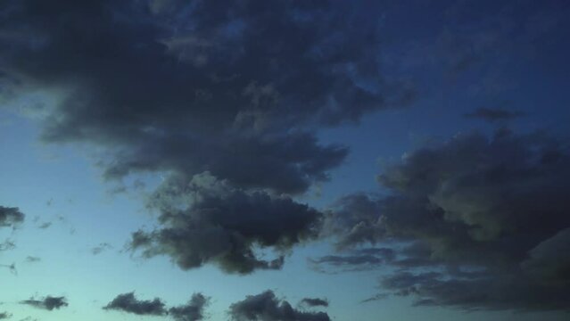 Time lapse. cloudy evening sky at sunset.