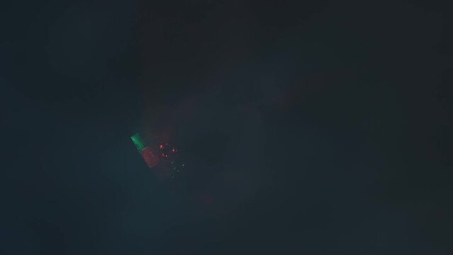 Color, RGB ball of color music shines with laser beams in the disco smoke. Concept of abstract background, dance floor, music and entertainment