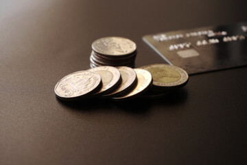Stack of money coin on black background, Saving money concept
