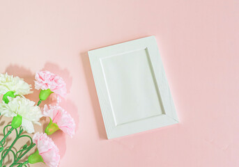 flower and  frame on pink background