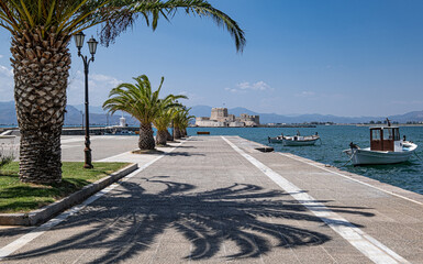 Fototapeta premium View of the strong and impressive Fortress of Bourtzi as seen from the coast and pier of Nafplio, Argolis, Peloponnese, Greece.
