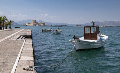 View of the strong and impressive Fortress of Bourtzi as seen from the coast and pier of Nafplio, Argolis, Peloponnese, Greece.