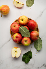 Top view of red yellow apples on plate fruits food
