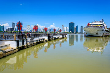 Naklejka premium The Lock Bridge of Love is located on the banks of the Han's River in Da Nang City, Vietnam. This is a favorite spot for young people and tourists 