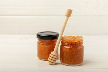 Honey in a glass jar. Remedy for colds and viral diseases. Organic product of a vegetarian diet. copy space. copy space