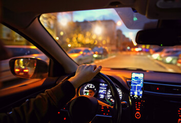 driving a car at night in the city