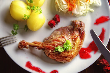 delicious duck served with potatoes and sauerkraut