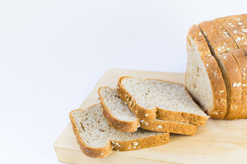 meal organic whole grain sliced ​​bread with oats on dining room