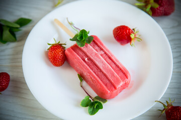 cooked homemade strawberry ice cream on a stick