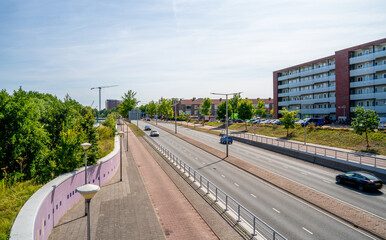 Street with road and apartment buildings in Amersfoort, Netherlands
