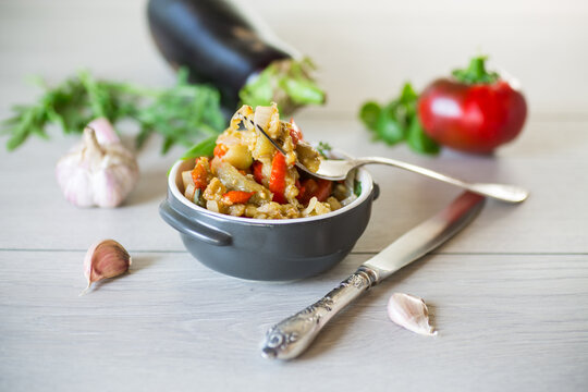 eggplant fried sauteed with other vegetables in a plate