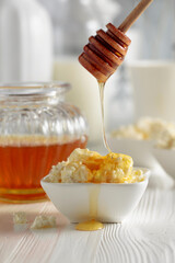 Fresh homemade cottage cheese with honey.