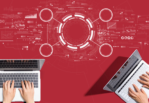 Tech circle with people working together with laptop computers