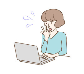 パソコンをしながら焦る女性　トラブル　ミス　詐欺　困る
