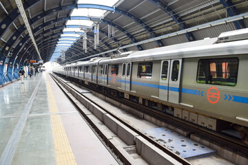 Delhi Metro train arriving at Jhandewalan metro station in New Delhi, India, Asia, Public Metro...
