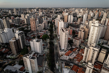 Fototapeta na wymiar Central region of the City of Campinas with buildings, avenues and cars in the early evening. Francisco Glicério Avenue, Orosimbo Maia Avenue and City Hall area.