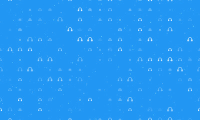 Seamless background pattern of evenly spaced white headphones symbols of different sizes and opacity. Vector illustration on blue background with stars
