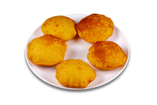 kombadi vade Served in a plate over white background. Selective focus. maharashtrian snacks.