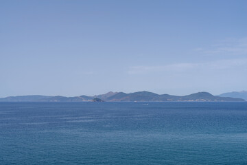 Fototapeta na wymiar Island of Elba seen from the Piombino, Italy