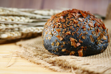 black color coconut bread on table 