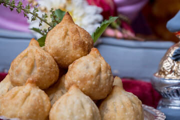 Ganesh Puja - Sweet Modak food offered on Ganpati festival or Chaturthi in India