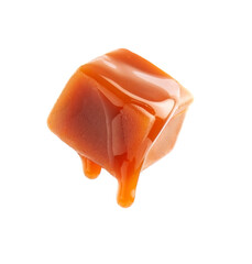 Falling caramel  candy with topping liquid closeup on white backgrounds.