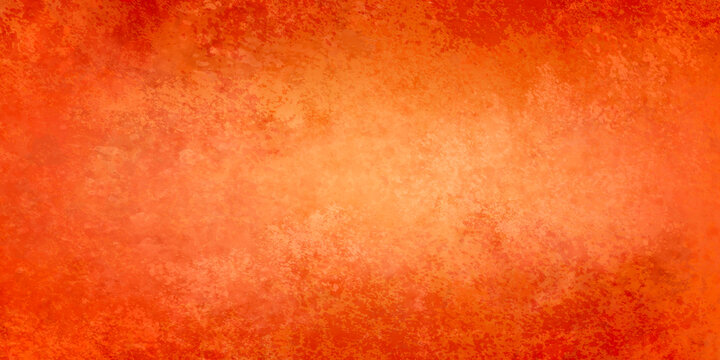 Abstract orange fire background texture, red border grunge in halloween fall or autumn colors of orange red and yellow. Orange paper or banner.