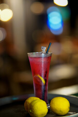 lemonade cranberry and black currant drink on dark  background.