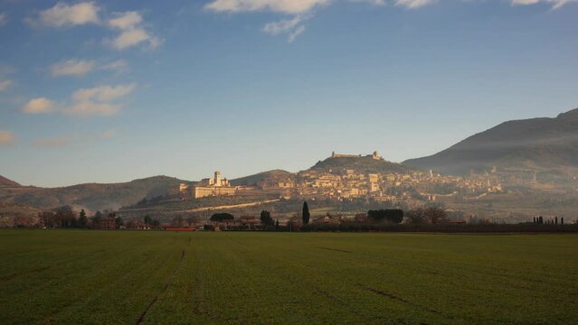 Assisi, Italy town skyline with the Basilica of Saint Francis of Assisi