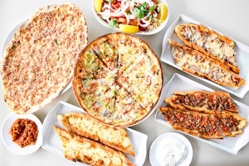 Delicious mixed pizza with rich content. Menu concept of choice and diversity. Sucuklu, Mantarli, karisik, akdeniz pizza