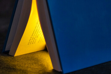 Close up view of open book. Selective focus. Ideal for education presentation. Drawing attention