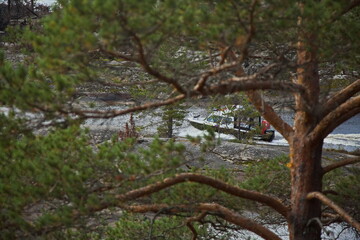 Pleasure boat in Ladoga skerries.