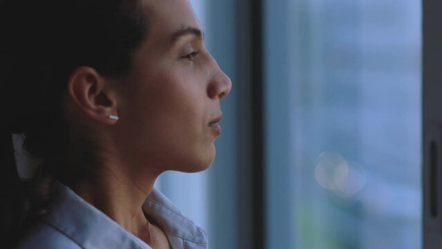 Night, window and business woman with smile for company growth and thinking of goal with a vision for success. Happy corporate manager, ceo or entrepreneur with motivation, leadership and career idea