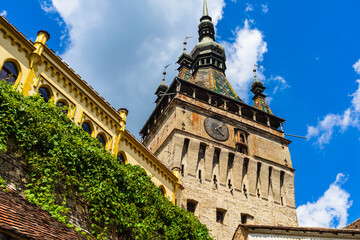 Obraz premium Medieval fortified citadel of Sighisoara city and the famous Clock Tower