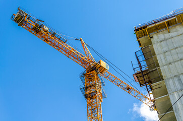 We are building a house with a tower crane.