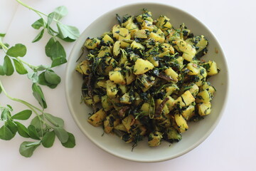 Aloo Methi. A sauteed potato side dish with fresh fragrant fenugreek leaves which is commonly known...