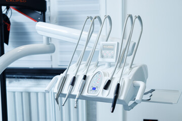 Close-up of dental chair tools. Dental Office