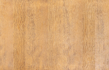 Naklejka premium background of a wooden plate of brown color with traces of wear