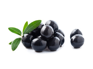 Black olives with leaves close up on white backgrounds.