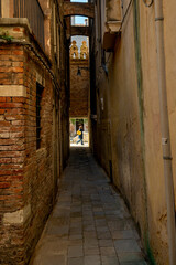 Fototapeta na wymiar narrow street in the town Venice, Italy