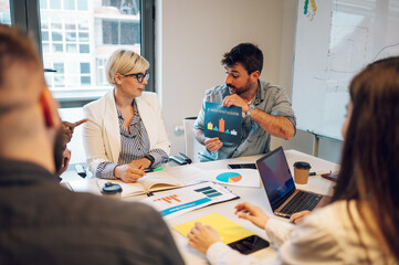 Multiracial business team having a meeting in the office