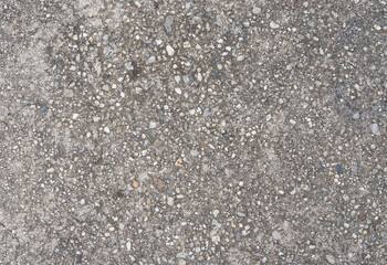 Old grey concrete wall with concrete texture for background. Front view with copy space.