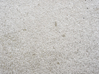 Old grey concrete wall with concrete texture for background. Front view with copy space.