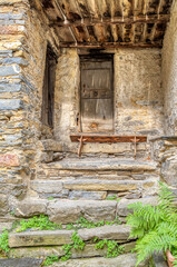 Fototapeta na wymiar Typical old style stone-made houses of Realdo, small village above the Ligurian Alps (Imperia Province, Northern Italy), near the Italy-French borders.