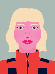 Close-up frontal portrait of young female paramedic, EMT or first aid worker wearing red jacket