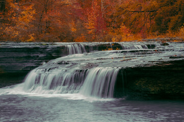Haw Creek Arkansas State Park recreation area waterfall cascade during Autumn color in the Ozark Mountains. 