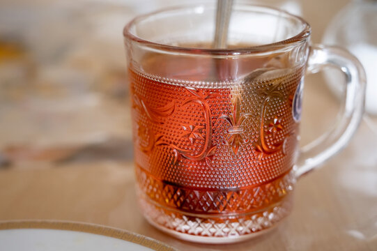 Close up glass cup of tea on a table