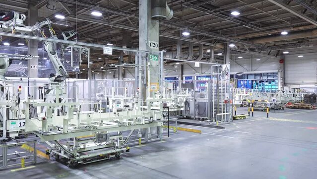 self-driving trolleys at car factory